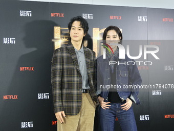 Actress Ying-Hsuan Hsieh and actor Xue Shiling pose at a promotional event in Taipei, Taiwan province, China, on November 19, 2024. (