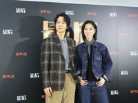 Actress Ying-Hsuan Hsieh and actor Xue Shiling pose at a promotional event in Taipei, Taiwan province, China, on November 19, 2024. (