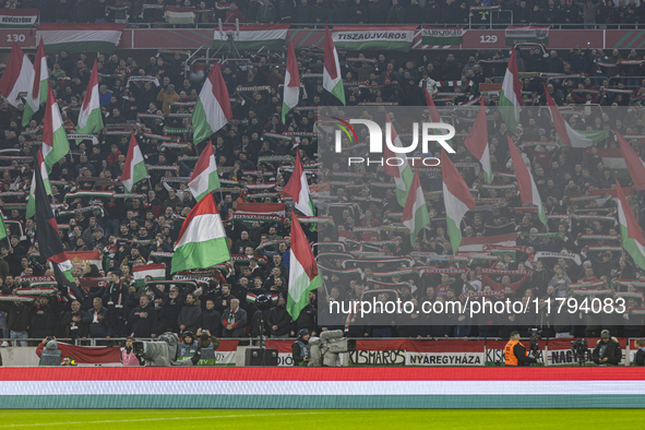 Hungarian fans and tricolor flags are present during the national anthem before the UEFA Nations League Group match at Puskas Arena in Budap...