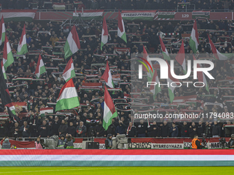 Hungarian fans and tricolor flags are present during the national anthem before the UEFA Nations League Group match at Puskas Arena in Budap...