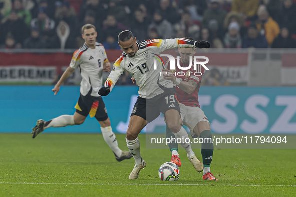 Leroy Sane of Germany competes for the ball with Zsolt Nagy of Hungary during the UEFA Nations League Group match at Puskas Arena in Budapes...