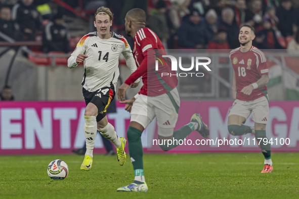 Julian Brandt of Germany competes for the ball with Loic Nego of Hungary during the UEFA Nations League Group match at Puskas Arena in Budap...