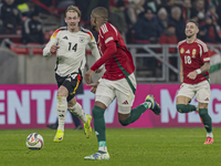 Julian Brandt of Germany competes for the ball with Loic Nego of Hungary during the UEFA Nations League Group match at Puskas Arena in Budap...