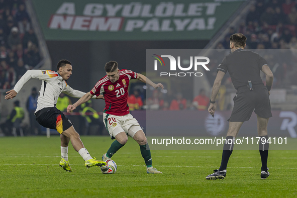 Roland Sallai of Hungary competes for the ball with Felix Nmecha of Germany during the UEFA Nations League Group match at Puskas Arena in Bu...