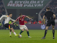 Roland Sallai of Hungary competes for the ball with Felix Nmecha of Germany during the UEFA Nations League Group match at Puskas Arena in Bu...