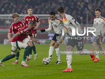 Jamal Musiala of Germany participates in the UEFA Nations League Group match at Puskas Arena in Budapest, Hungary, on November 19, 2024. (