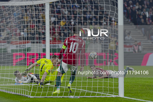 Goalkeeper of Hungary, Denes Dibusz, saves during the UEFA Nations League Group match at Puskas Arena in Budapest, Hungary, on November 19,...