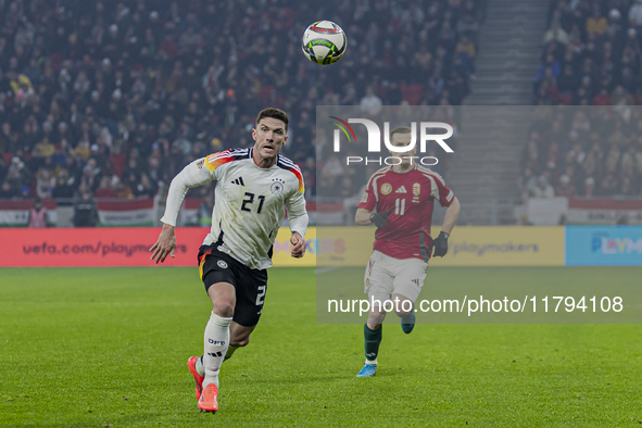 Robin Gosens of Germany competes for the ball with Daniel Gera of Hungary during the UEFA Nations League Group match at Puskas Arena in Buda...