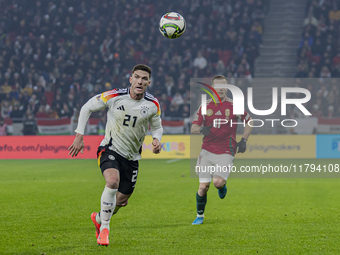 Robin Gosens of Germany competes for the ball with Daniel Gera of Hungary during the UEFA Nations League Group match at Puskas Arena in Buda...