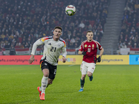 Robin Gosens of Germany competes for the ball with Daniel Gera of Hungary during the UEFA Nations League Group match at Puskas Arena in Buda...