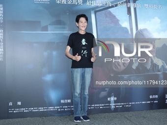 Actor Hsiang Hsi attends the premiere of the film ''A Journey in Spring'' at the Golden Horse Awards in Taipei, Taiwan province, China, on N...