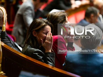 Elsa Faucillon, deputy of the Gauche Democrate et Republicaine group, is seen during the session of questions to the French government at th...