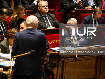 Patrick Hetzel, Minister of Higher Education and Research, listens to the speech of Didier Migaud, Keeper of the Seals and Minister of Justi...