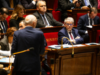 Patrick Hetzel, Minister of Higher Education and Research, listens to the speech of Didier Migaud, Keeper of the Seals and Minister of Justi...