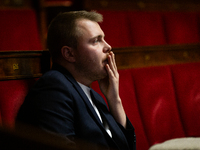 Louis Boyard, deputy of the La France Insoumise - Nouveau Front Populaire group, is seen during the questions to the government session at t...