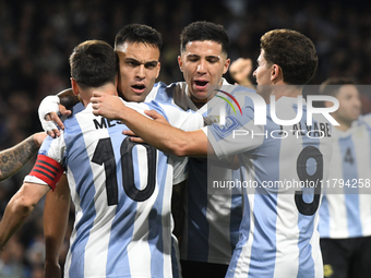 Lautaro Martinez, Lionel Messi, Enzo Fernandez, and Julian Alvarez of Argentina celebrate their team's goal during the match between Argenti...