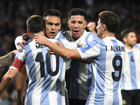 Lautaro Martinez, Lionel Messi, Enzo Fernandez, and Julian Alvarez of Argentina celebrate their team's goal during the match between Argenti...