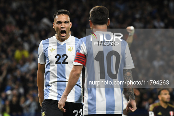 Lautaro Martinez and Lionel Messi of Argentina celebrate their team's goal during the match between Argentina and Peru at Alberto J. Armando...