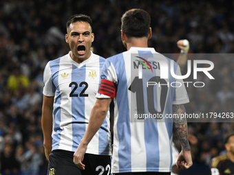 Lautaro Martinez and Lionel Messi of Argentina celebrate their team's goal during the match between Argentina and Peru at Alberto J. Armando...