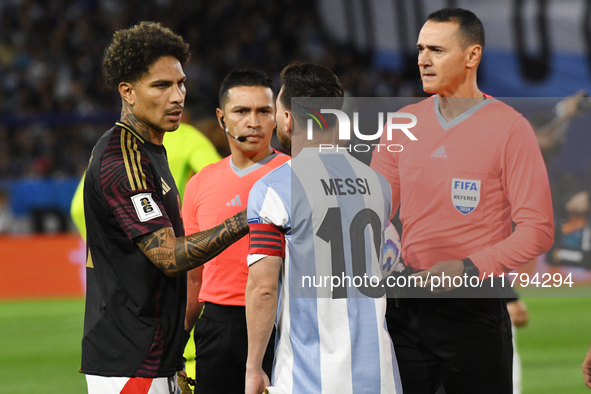 Paolo Guerrero of Peru and Lionel Messi of Argentina shake hands before the match between Argentina and Peru at Alberto J. Armando - La Bomb...