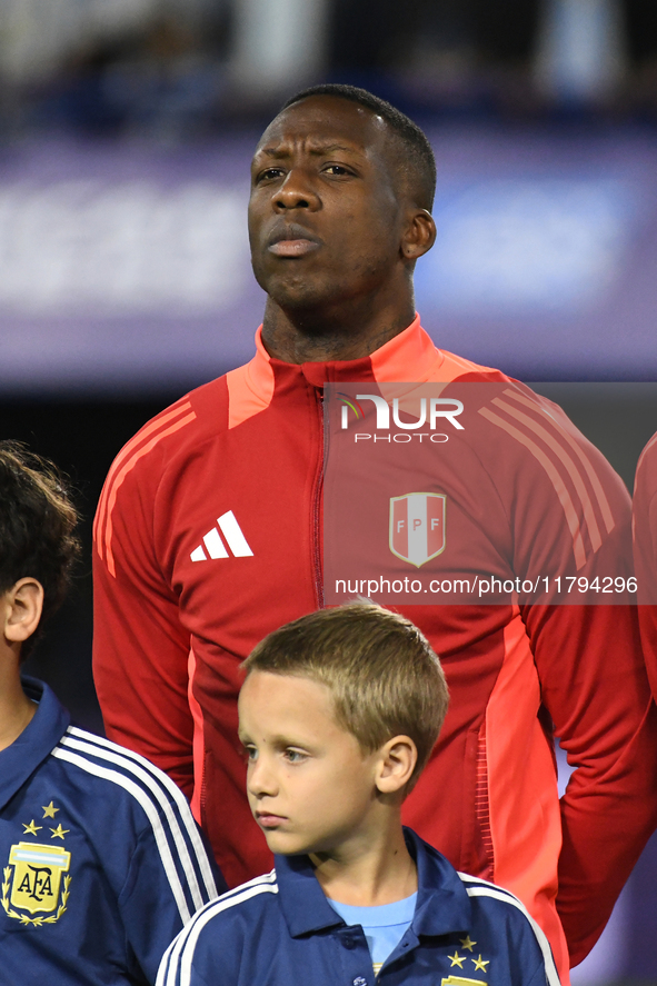 Luis Advincula of Peru stands during the national anthems ceremony before the match between Argentina and Peru at Alberto J. Armando - La Bo...