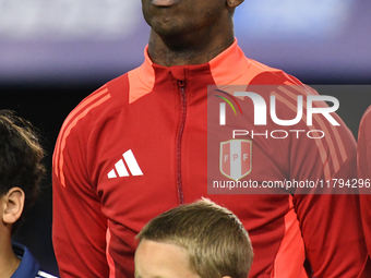 Luis Advincula of Peru stands during the national anthems ceremony before the match between Argentina and Peru at Alberto J. Armando - La Bo...