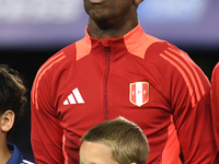 Luis Advincula of Peru stands during the national anthems ceremony before the match between Argentina and Peru at Alberto J. Armando - La Bo...