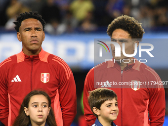 Pedro Gallese and Paolo Guerrero of Peru stand during the national anthems ceremony before the match between Argentina and Peru at Alberto J...