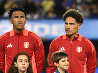 Pedro Gallese and Paolo Guerrero of Peru stand during the national anthems ceremony before the match between Argentina and Peru at Alberto J...