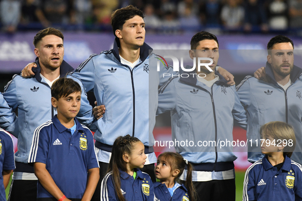 Alexis Mac Allister, Leonardo Balerdi, Gonzalo Montiel, and Nicolas Tagliafico of Argentina stand during the national anthems ceremony befor...