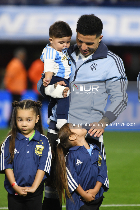 Enzo Fernandez of Argentina stands during the national anthems ceremony before the match between Argentina and Peru at Alberto J. Armando -...