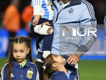 Enzo Fernandez of Argentina stands during the national anthems ceremony before the match between Argentina and Peru at Alberto J. Armando -...