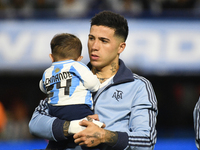 Enzo Fernandez of Argentina stands during the national anthems ceremony before the match between Argentina and Peru at Alberto J. Armando -...