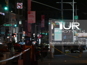 Evidence markers mark the scene where a police-involved shooting occurs in Jamaica, Queens, United States, on November 19, 2024. At 5:35 pm,...