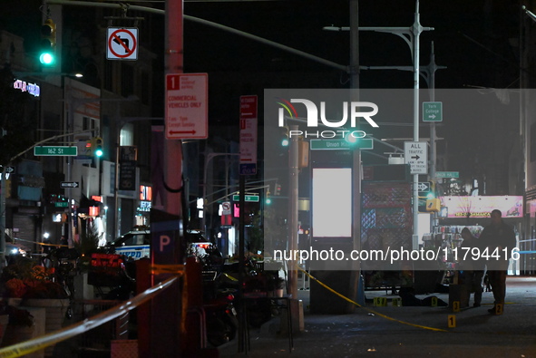 Evidence markers mark the scene where a police-involved shooting occurs in Jamaica, Queens, United States, on November 19, 2024. At 5:35 pm,...