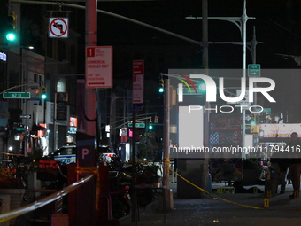 Evidence markers mark the scene where a police-involved shooting occurs in Jamaica, Queens, United States, on November 19, 2024. At 5:35 pm,...