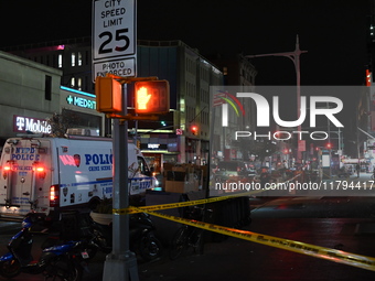 Evidence markers mark the scene where a police-involved shooting occurs in Jamaica, Queens, United States, on November 19, 2024. At 5:35 pm,...