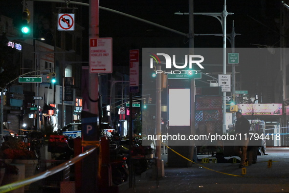 Evidence markers mark the scene where a police-involved shooting occurs in Jamaica, Queens, United States, on November 19, 2024. At 5:35 pm,...