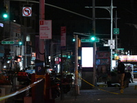 Evidence markers mark the scene where a police-involved shooting occurs in Jamaica, Queens, United States, on November 19, 2024. At 5:35 pm,...