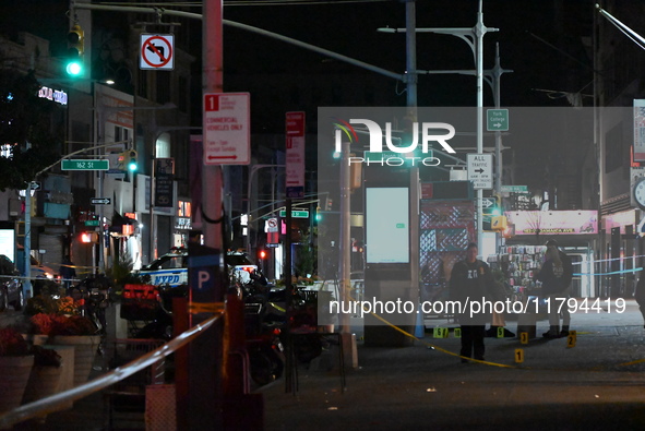 Evidence markers mark the scene where a police-involved shooting occurs in Jamaica, Queens, United States, on November 19, 2024. At 5:35 pm,...