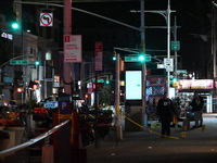 Evidence markers mark the scene where a police-involved shooting occurs in Jamaica, Queens, United States, on November 19, 2024. At 5:35 pm,...