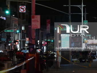 Evidence markers mark the scene where a police-involved shooting occurs in Jamaica, Queens, United States, on November 19, 2024. At 5:35 pm,...