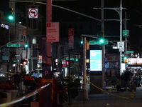 Evidence markers mark the scene where a police-involved shooting occurs in Jamaica, Queens, United States, on November 19, 2024. At 5:35 pm,...