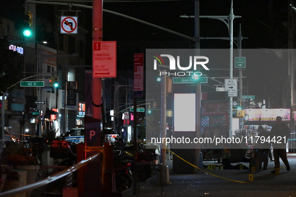 Evidence markers mark the scene where a police-involved shooting occurs in Jamaica, Queens, United States, on November 19, 2024. At 5:35 pm,...