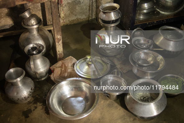 Water is stored in jars after being collected from the reservoir, locally known as ''Jhiri,'' in Durgapur, Netrokona, Bangladesh, on Novembe...