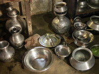 Water is stored in jars after being collected from the reservoir, locally known as ''Jhiri,'' in Durgapur, Netrokona, Bangladesh, on Novembe...