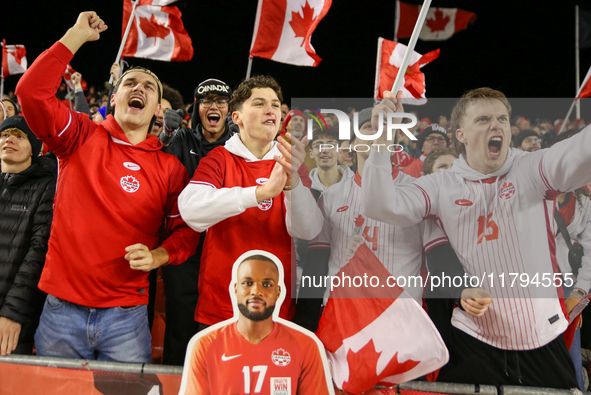 Fans celebrate Team Canada's goal during the CONCACAF Nations League Quarter Final Match between Team Canada and Suriname at BMO Field in To...