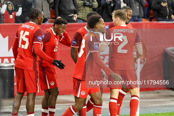 J. David #20 celebrates his goal with other Team Canada players during the CONCACAF Nations League Quarter Final match between Team Canada a...