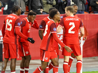 J. David #20 celebrates his goal with other Team Canada players during the CONCACAF Nations League Quarter Final match between Team Canada a...