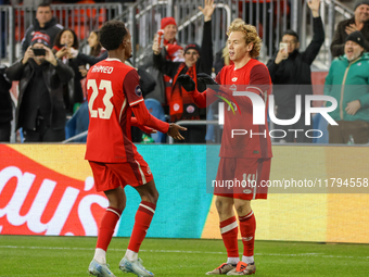 J. Shaffelburg #14 celebrates his goal with Ahmed #23 during the CONCACAF Nations League Quarter Final match between Team Canada and Surinam...